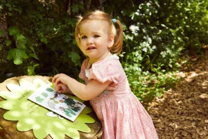 Little girl exploring the fairy trail
