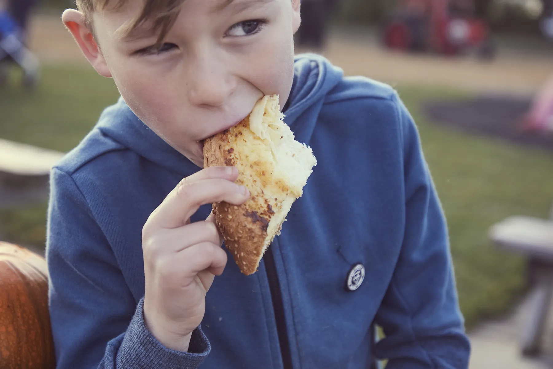 Boy Eating Pizza